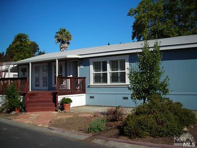 5313 Rexford Way, Unit 5313 Santa Rosa, CA 95403 - Photo 1 of 1 Viet of front corner with one driveway space for parking. Additional 1+ car parking on other side under carpor.