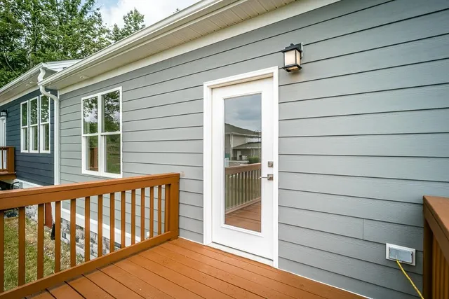a view of a porch with wooden floor