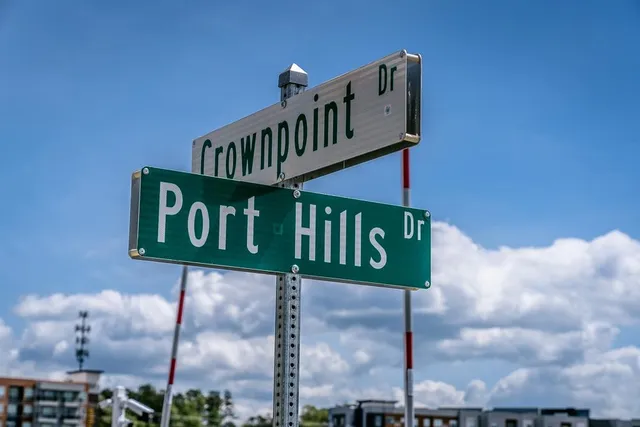 a street sign on a pole on a street