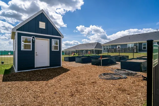 a view of a house with backyard porch and patio