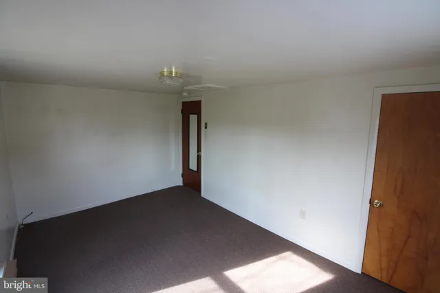 an empty room with an empty space