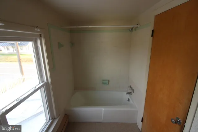 a bathroom with a bathtub