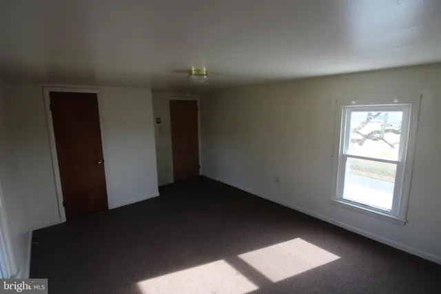 an empty room with a window