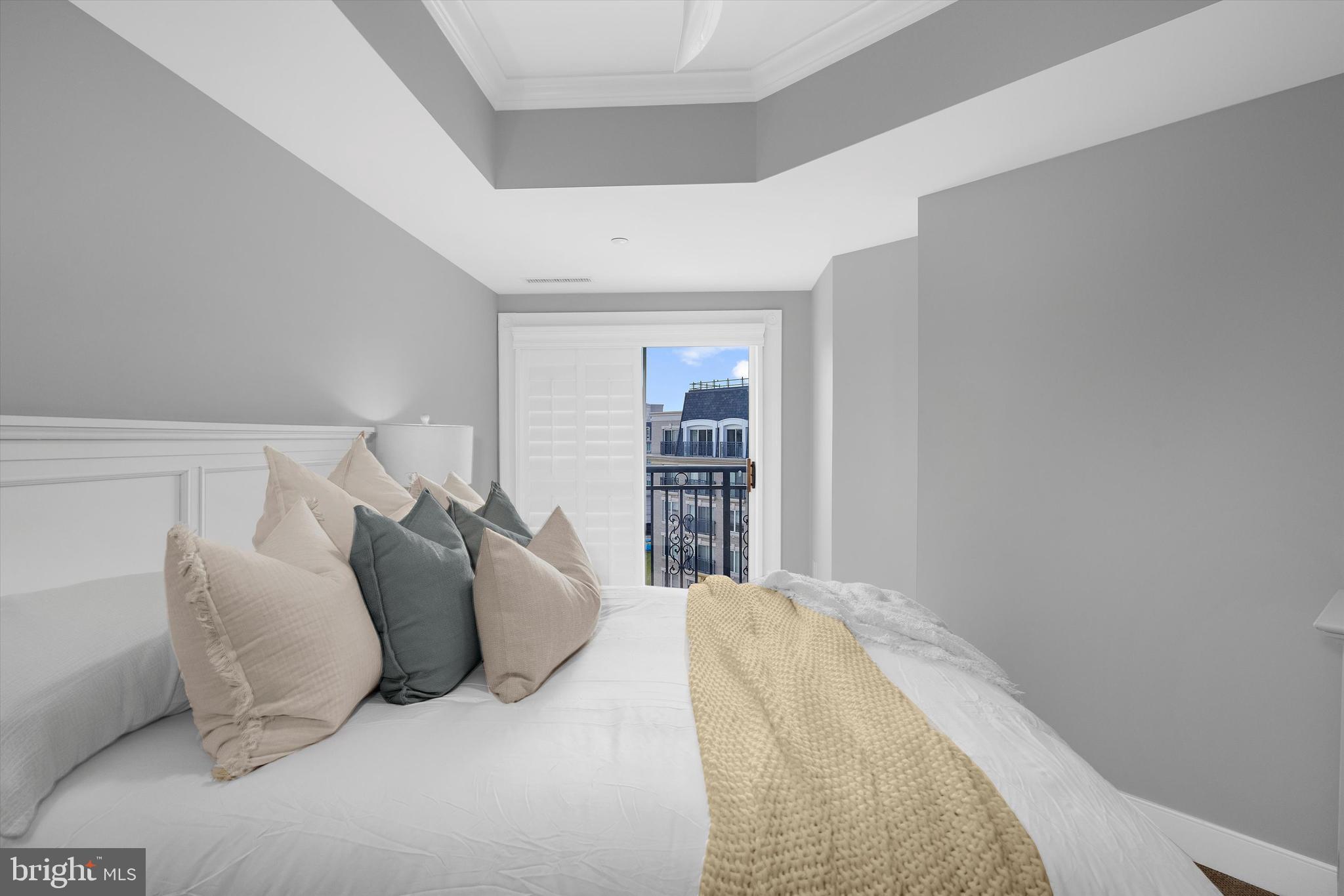 5 Park Place, Unit 702 Annapolis, MD 21401 - Photo 17 of 55 a view of a bedroom with a bed and closet