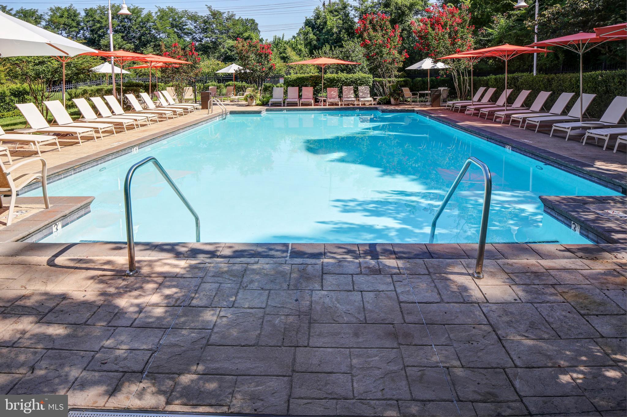 5 Park Place, Unit 702 Annapolis, MD 21401 - Photo 38 of 55 a view of a swimming pool with an outdoor seating
