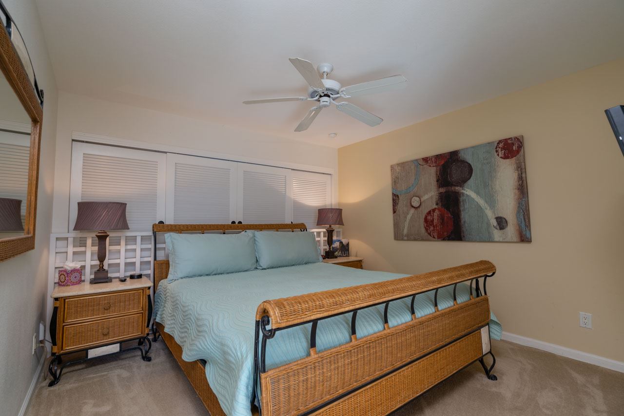2777 South Kihei Road, Unit L204 Kihei, HI 96753 - Photo 13 of 30 a bedroom with a bed and furniture