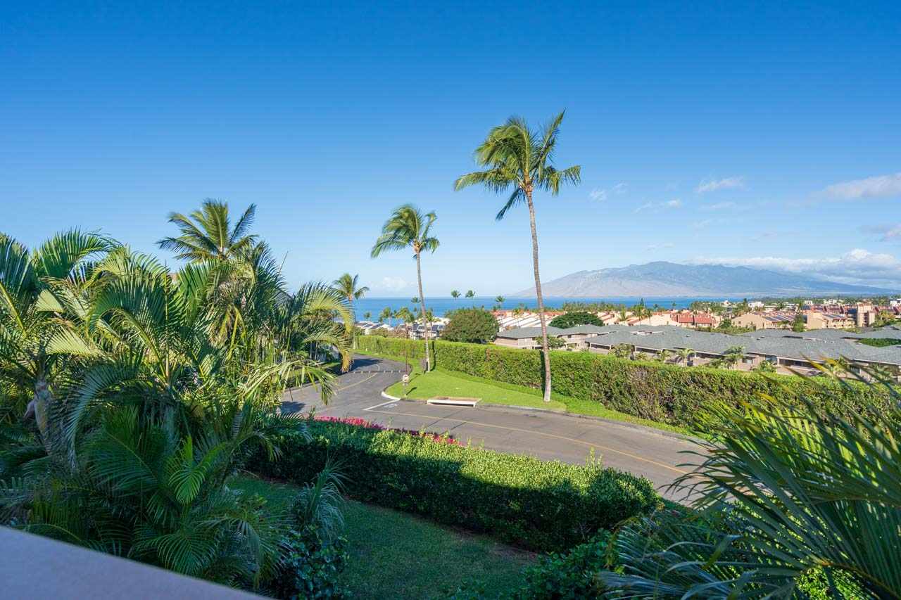 2777 South Kihei Road, Unit L204 Kihei, HI 96753 - Photo 29 of 30 a view of a garden from a bench