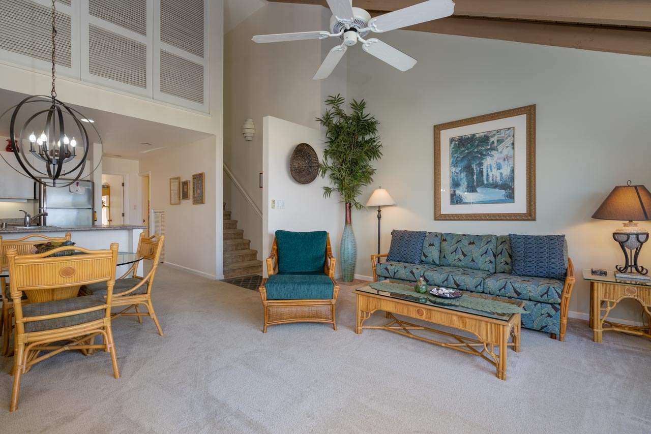 2777 South Kihei Road, Unit L204 Kihei, HI 96753 - Photo 4 of 30 a living room with furniture and a chandelier