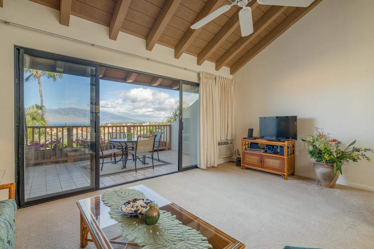 2777 South Kihei Road, Unit L204 Kihei, HI 96753 - Photo 7 of 30 a living room with furniture and a potted plant