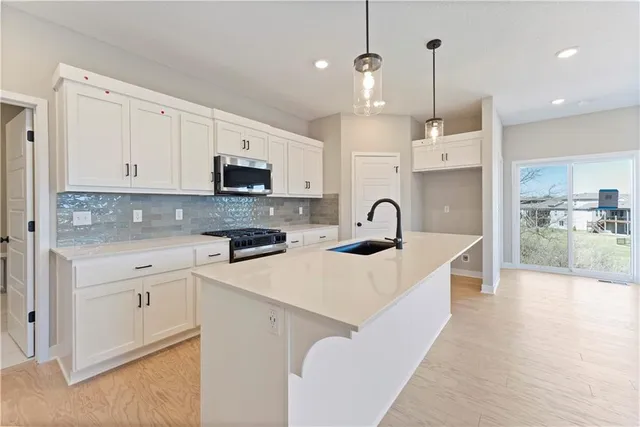 $344,468 | 1222 Southeast Windbreak Drive, Lee's Summit, MO 64081