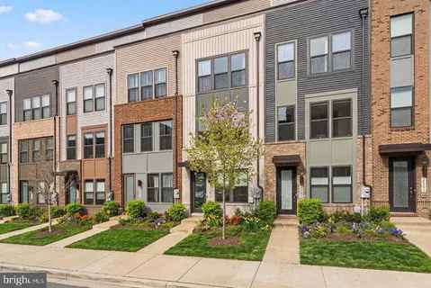 a front view of a multi story residential apartment building