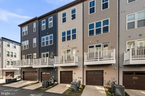 a front view of a building with many windows