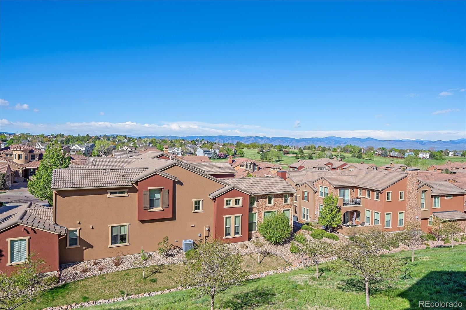 9317 Viaggio Way Highlands Ranch, CO 80126 - Photo 22 of 50 an aerial view of residential houses with outdoor space and street view