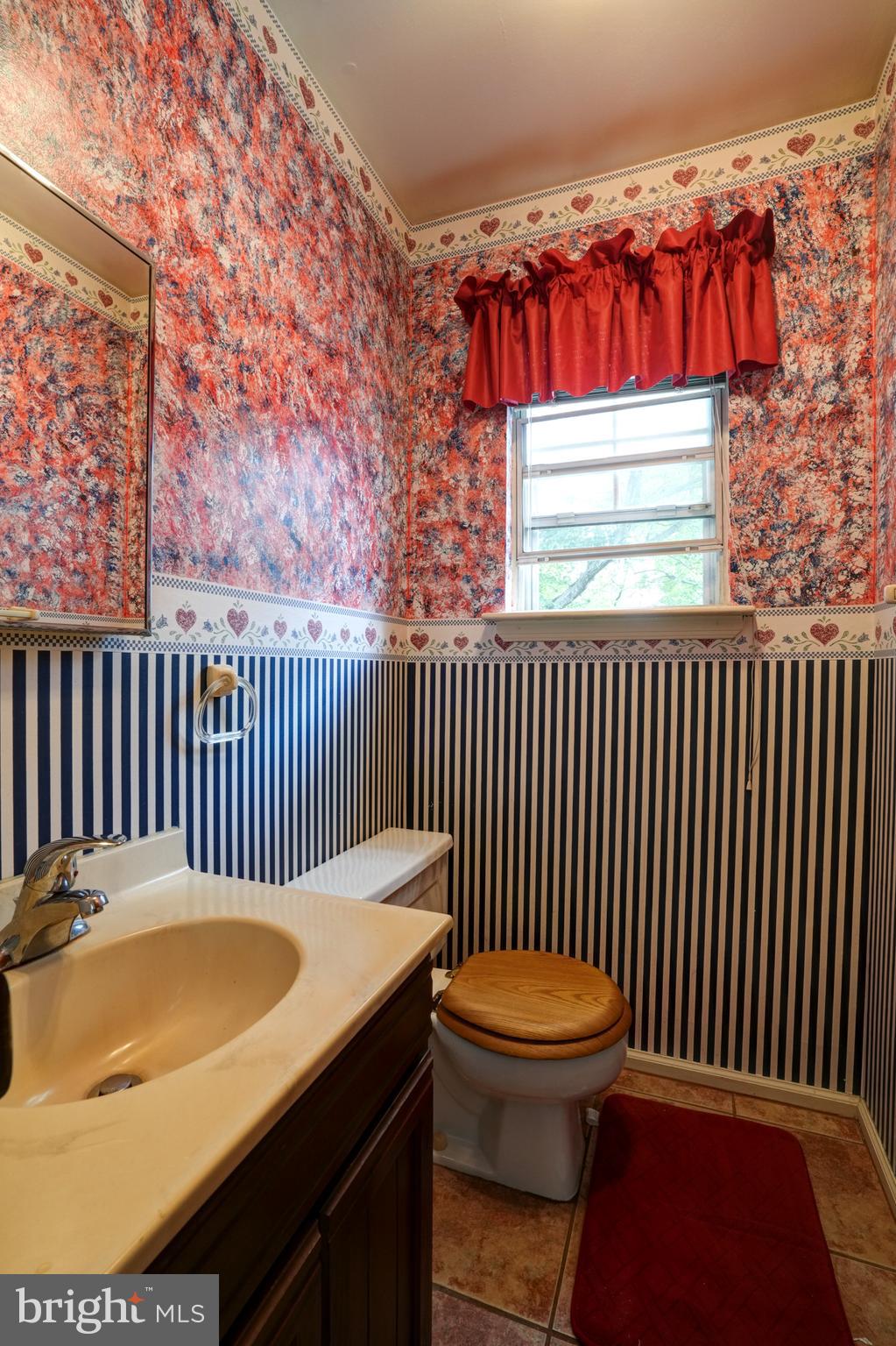 70 St Davids Road Springfield, PA 19064 - Photo 12 of 39 a backyard of a house with wooden floor table and chairs