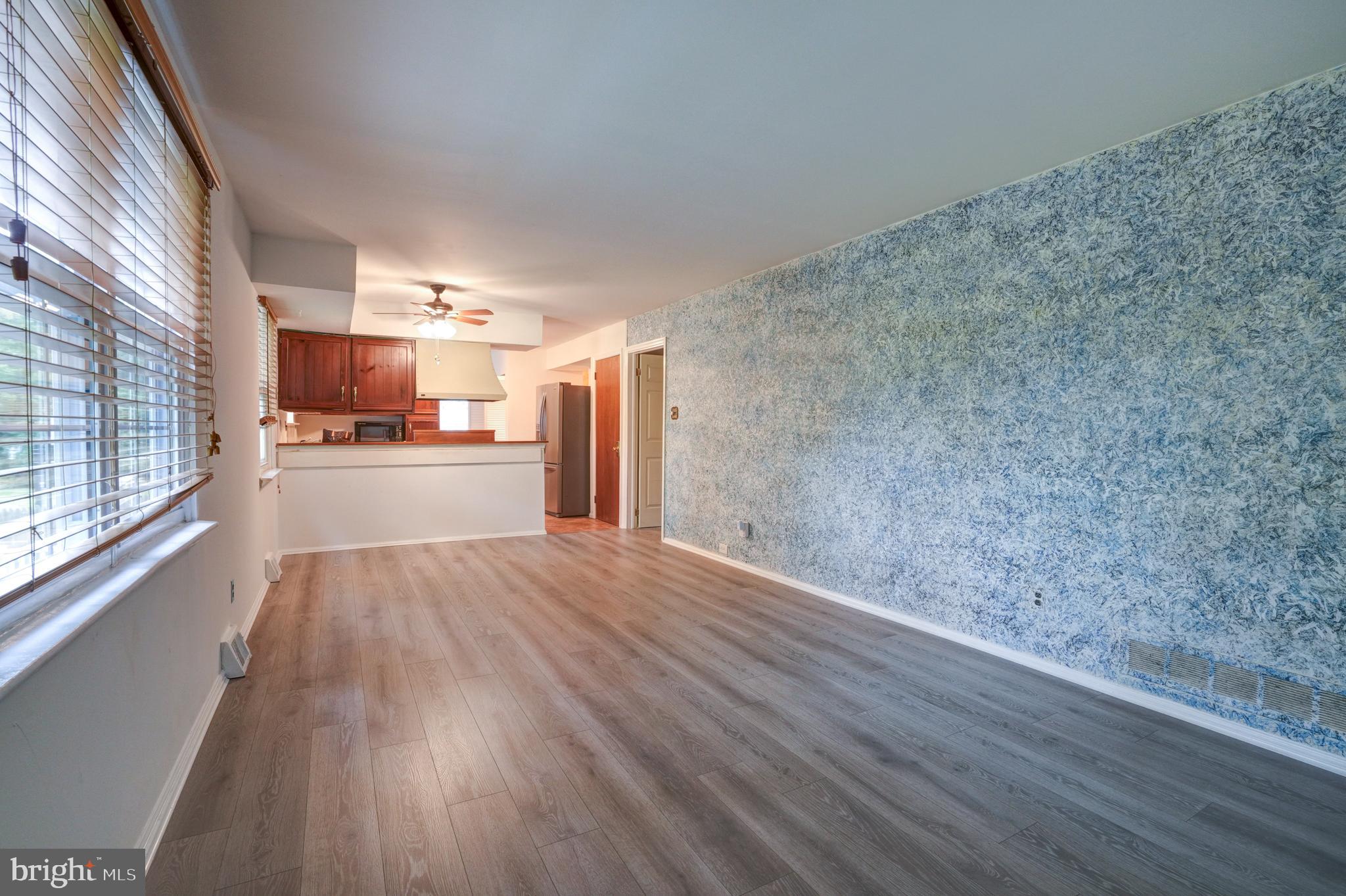 70 St Davids Road Springfield, PA 19064 - Photo 13 of 39 a view of a living room hardwood floor and a ceiling fan