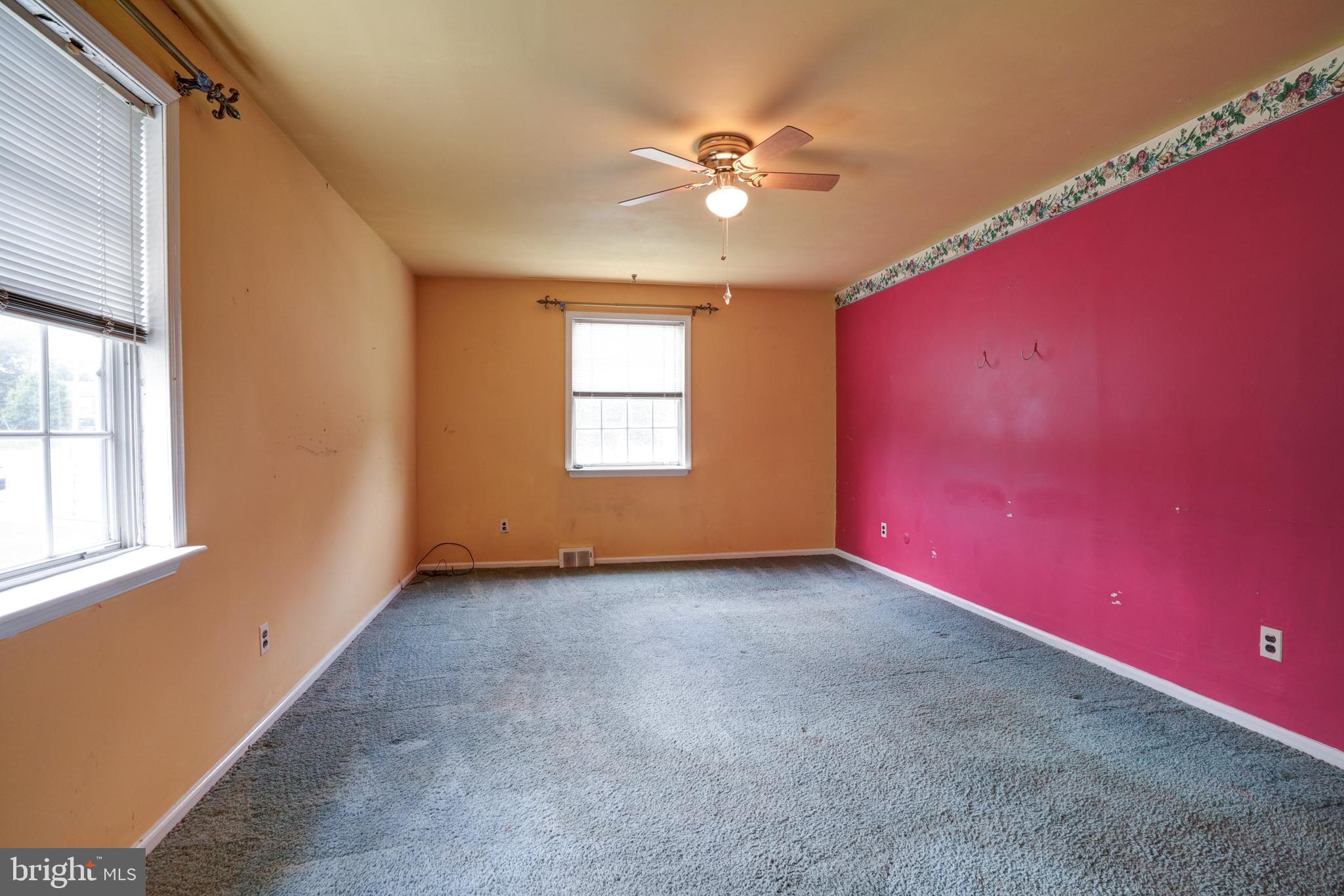 70 St Davids Road Springfield, PA 19064 - Photo 15 of 39 an empty room with windows and fan