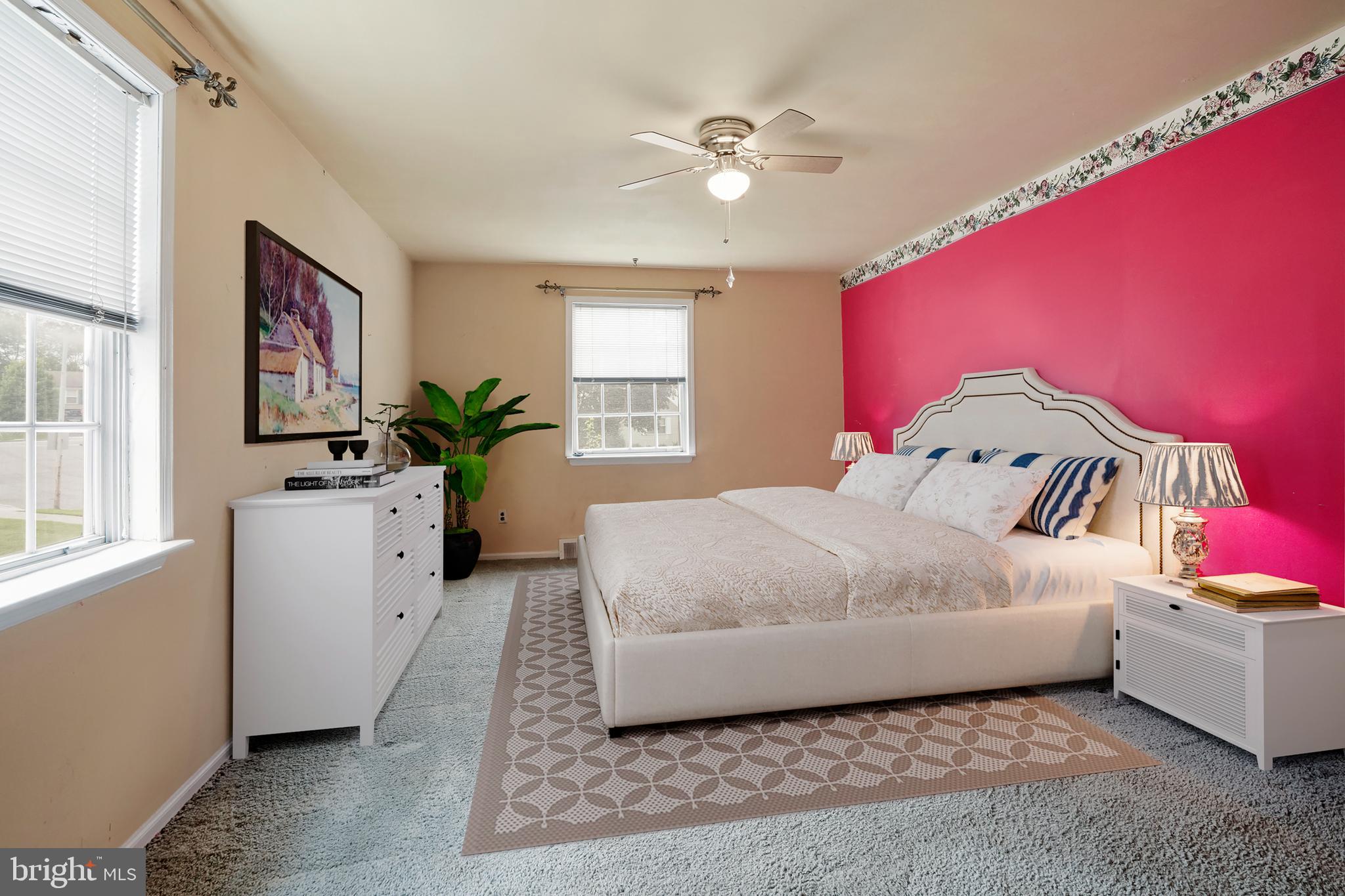 70 St Davids Road Springfield, PA 19064 - Photo 16 of 39 a bedroom with a bed a chandelier and dresser