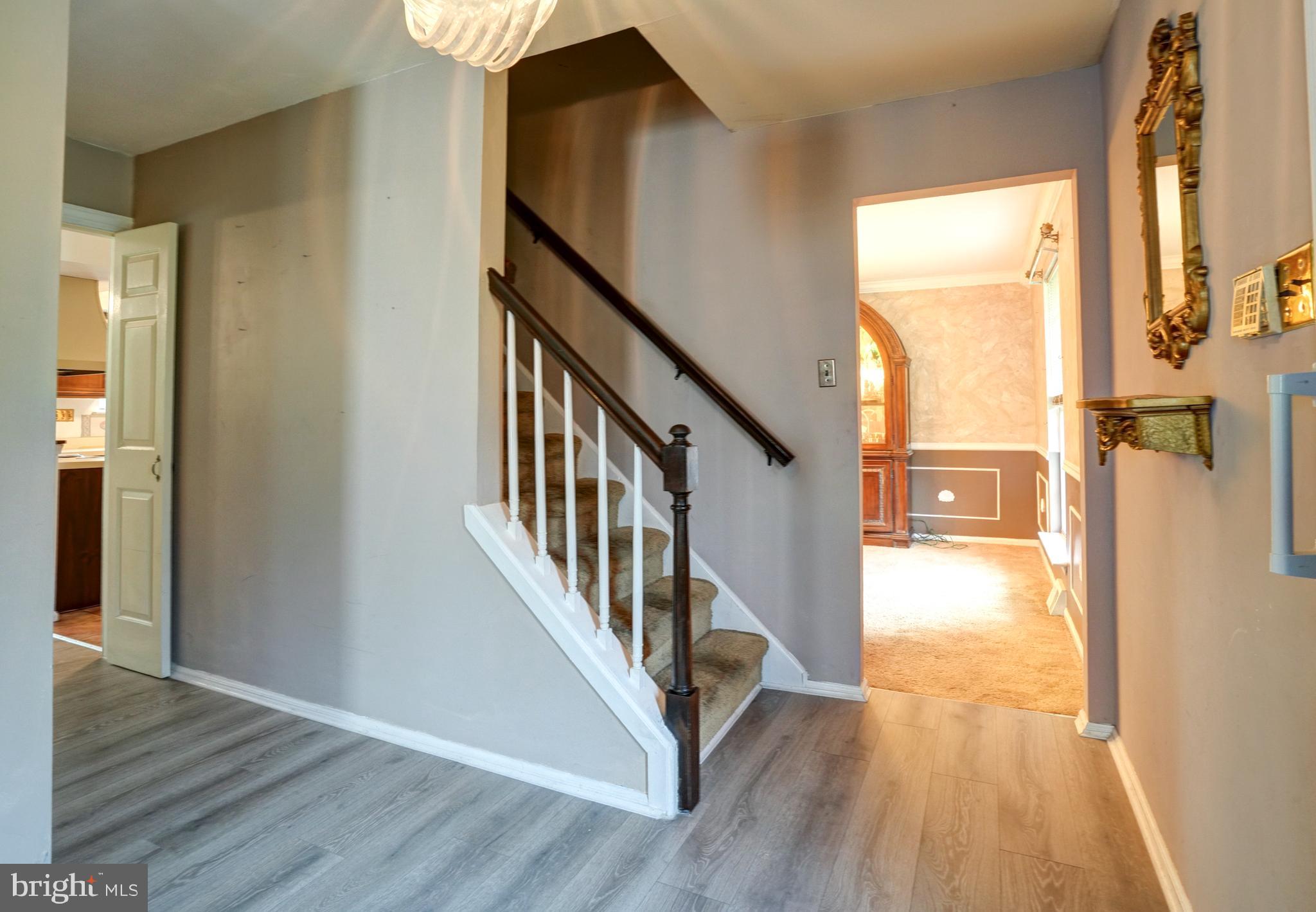 70 St Davids Road Springfield, PA 19064 - Photo 2 of 39 a view of an entryway with wooden floor and door