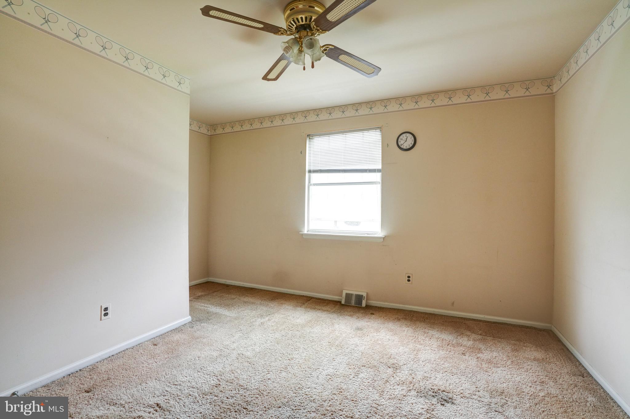 70 St Davids Road Springfield, PA 19064 - Photo 24 of 39 an empty room with windows and fan