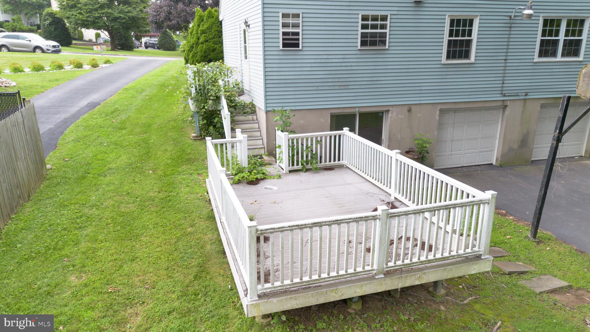 70 St Davids Road Springfield, PA 19064 - Photo 29 of 39 a view of a wooden deck and a backyard