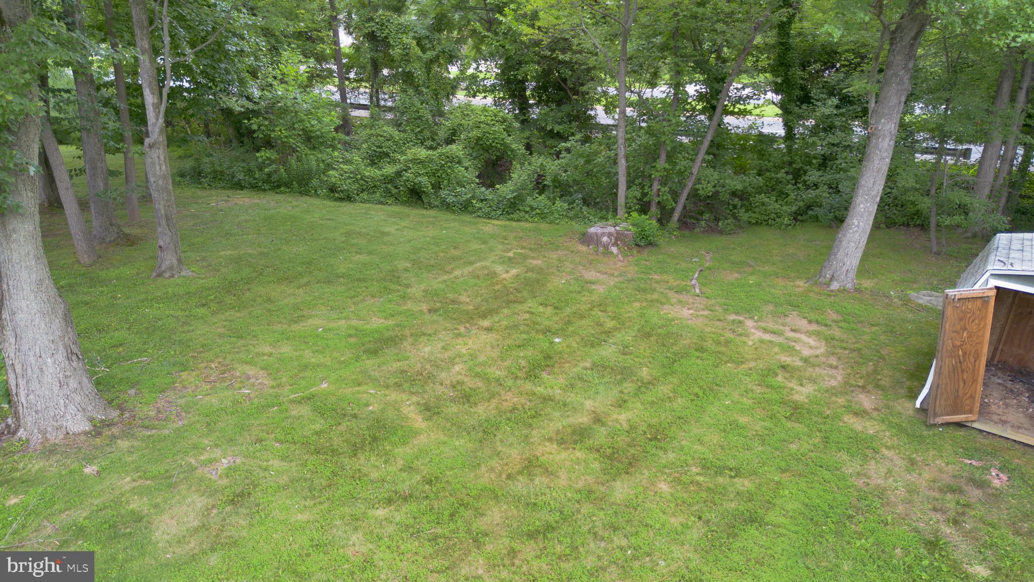 70 St Davids Road Springfield, PA 19064 - Photo 32 of 39 a view of outdoor space with deck and yard