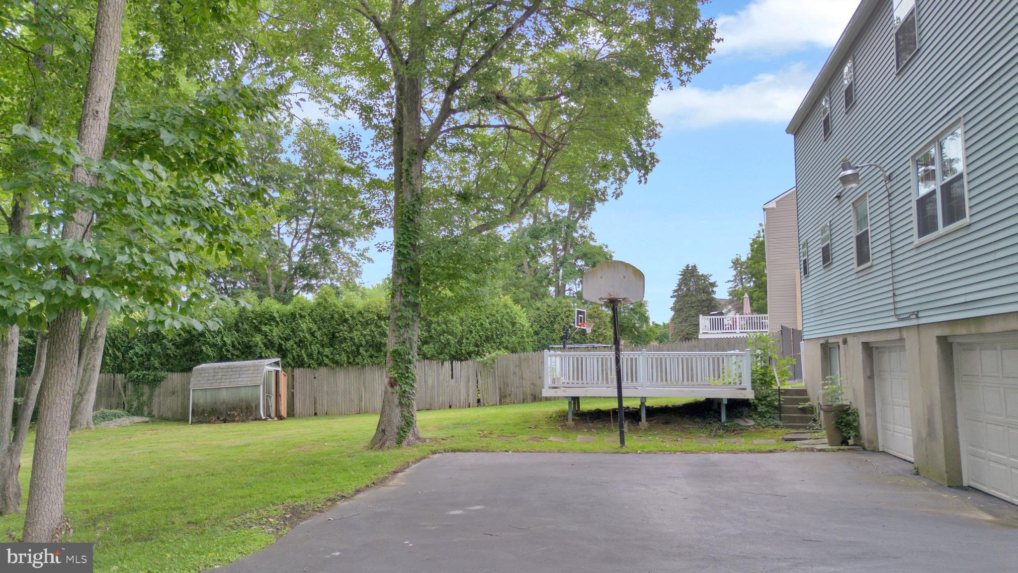 70 St Davids Road Springfield, PA 19064 - Photo 37 of 39 a view of backyard with barbeque grill and fence