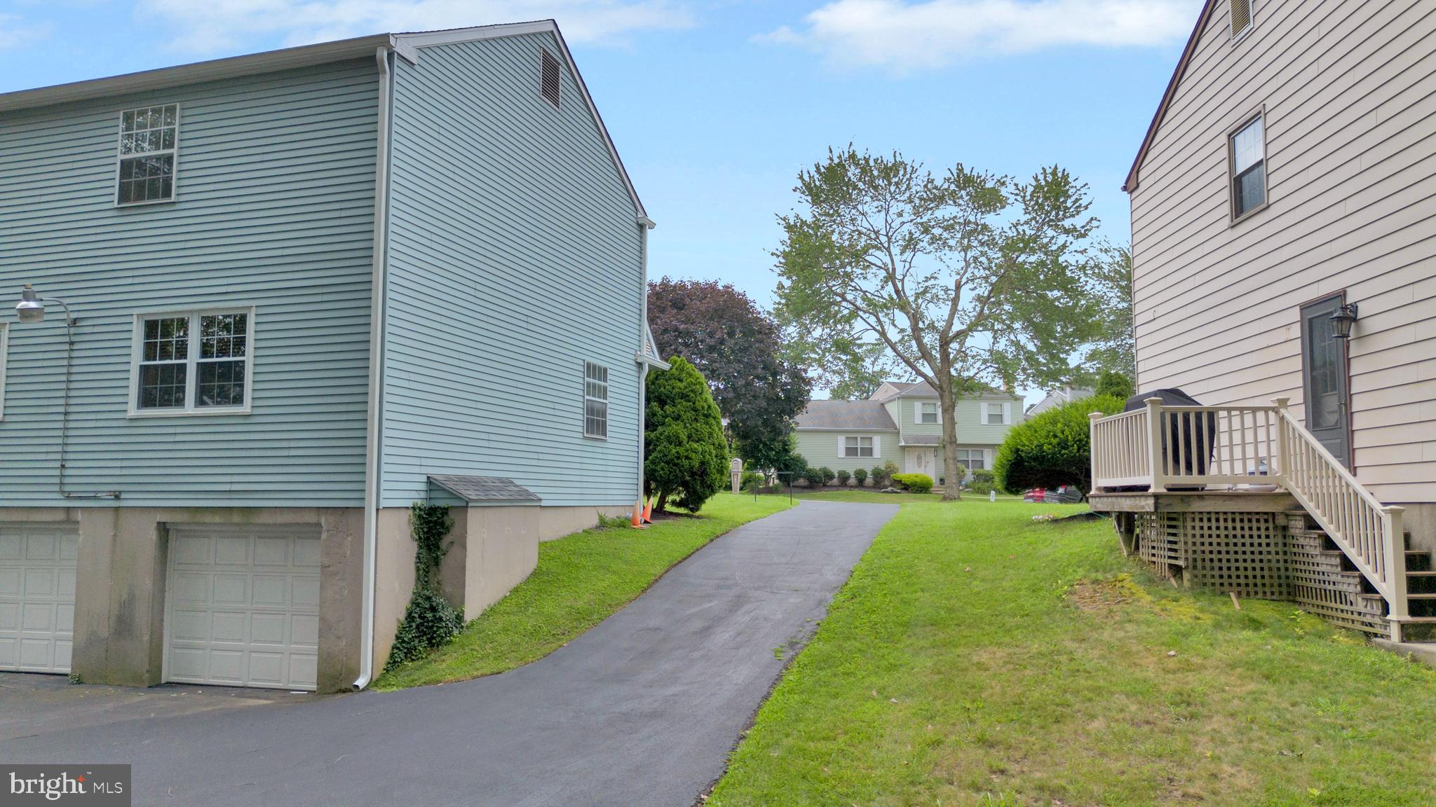 70 St Davids Road Springfield, PA 19064 - Photo 38 of 39 a front view of a house with a yard and trees