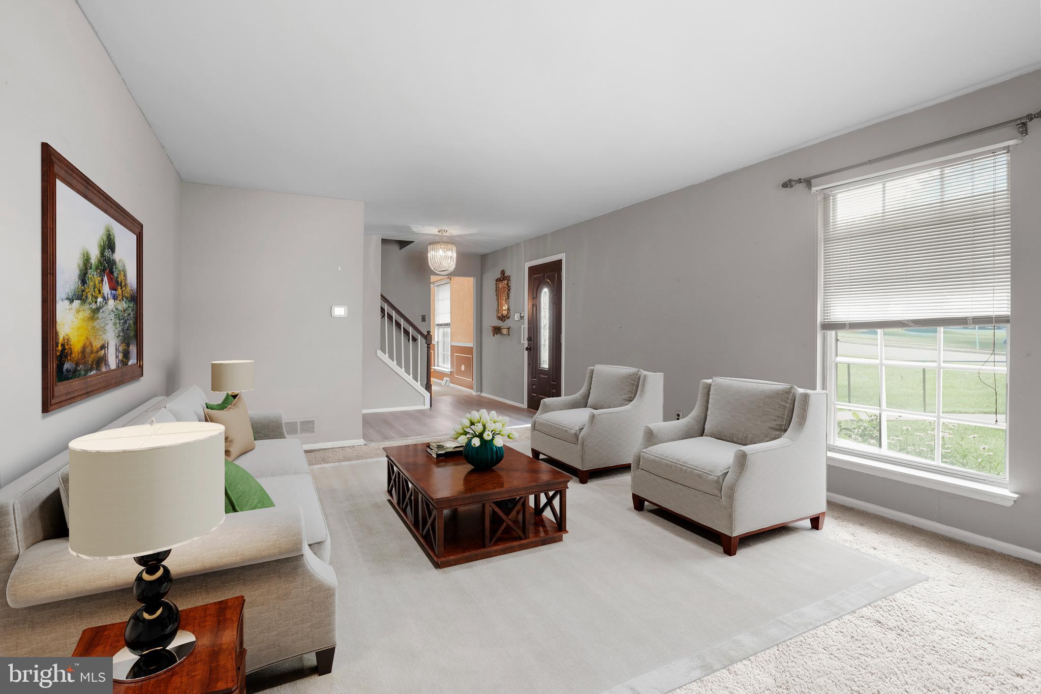 70 St Davids Road Springfield, PA 19064 - Photo 4 of 39 a living room with furniture and a large window