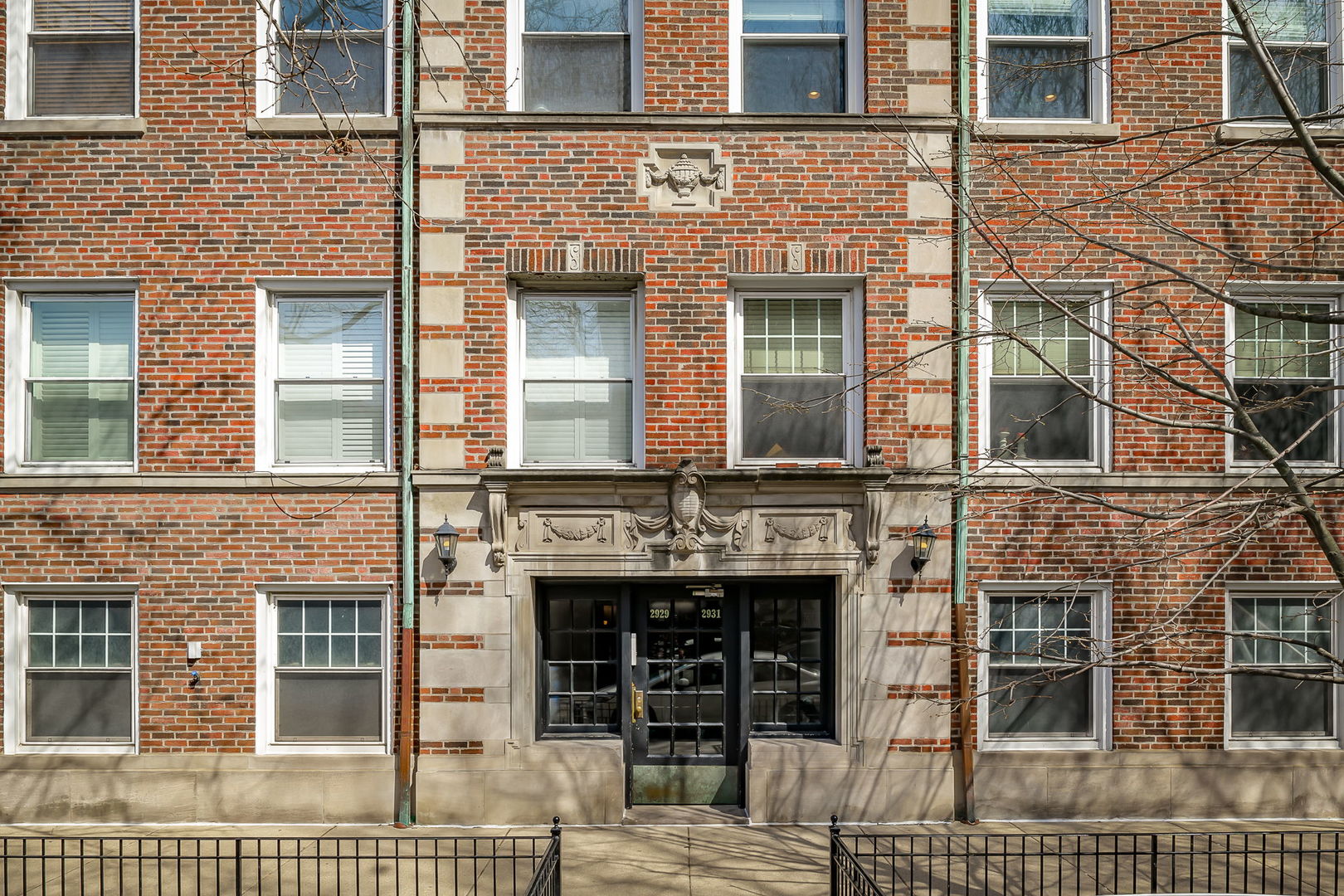 front view of a brick house with a door