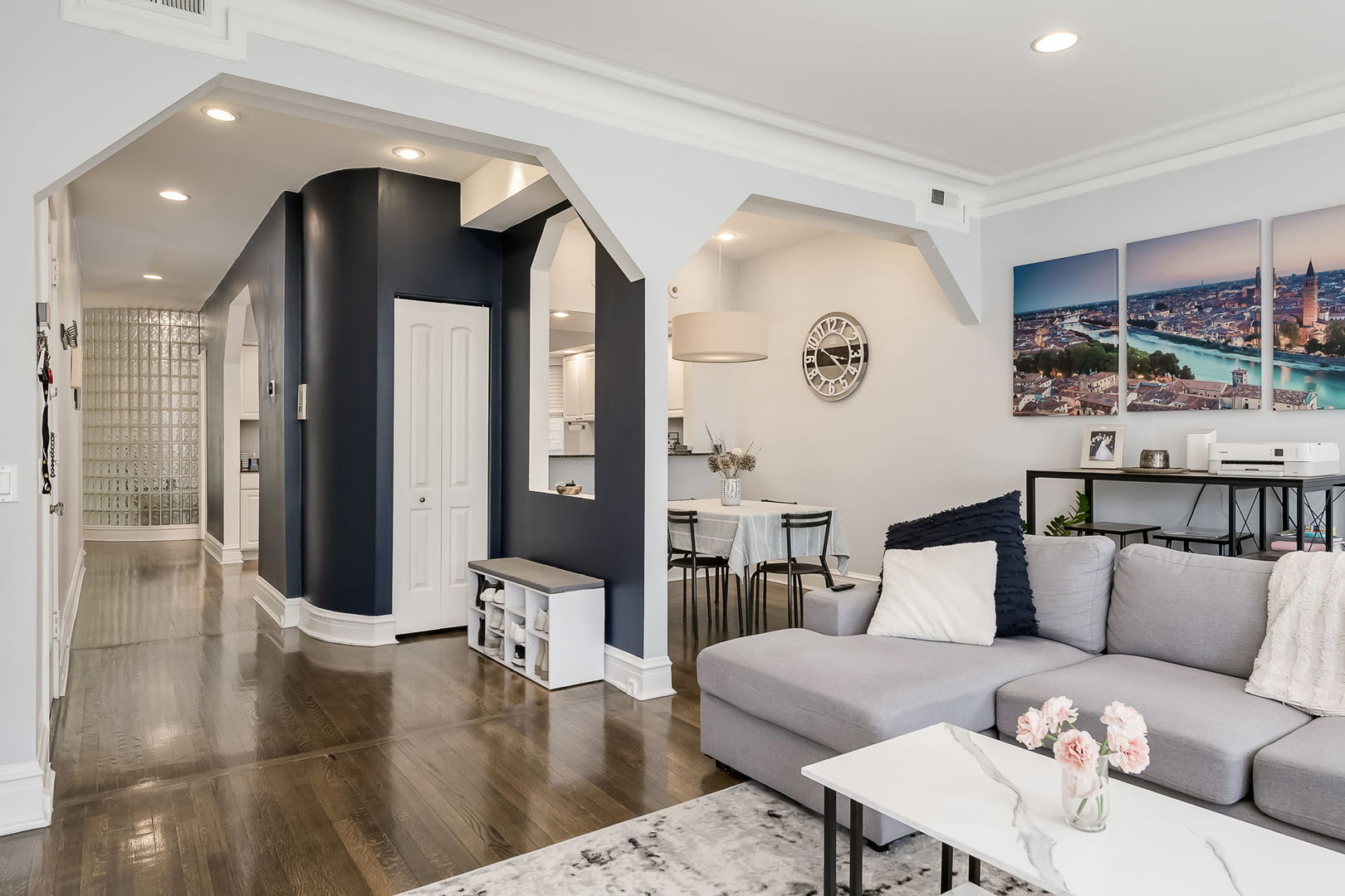 Undisclosed Address Chicago, IL 60657 - Photo 11 of 24 a living room with furniture and a large window