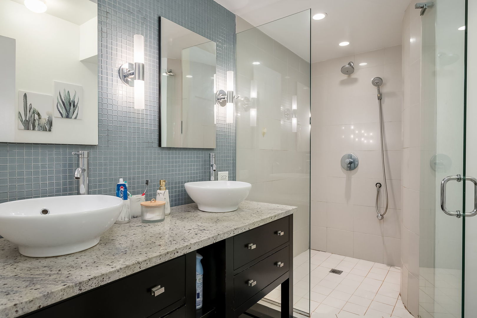 Undisclosed Address Chicago, IL 60657 - Photo 18 of 24 a bathroom with a granite countertop sink mirror and double