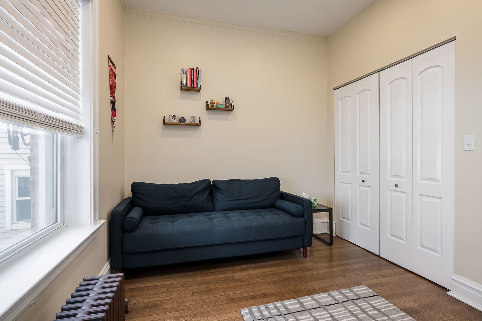 Undisclosed Address Chicago, IL 60657 - Photo 23 of 24 a living room with furniture and a window