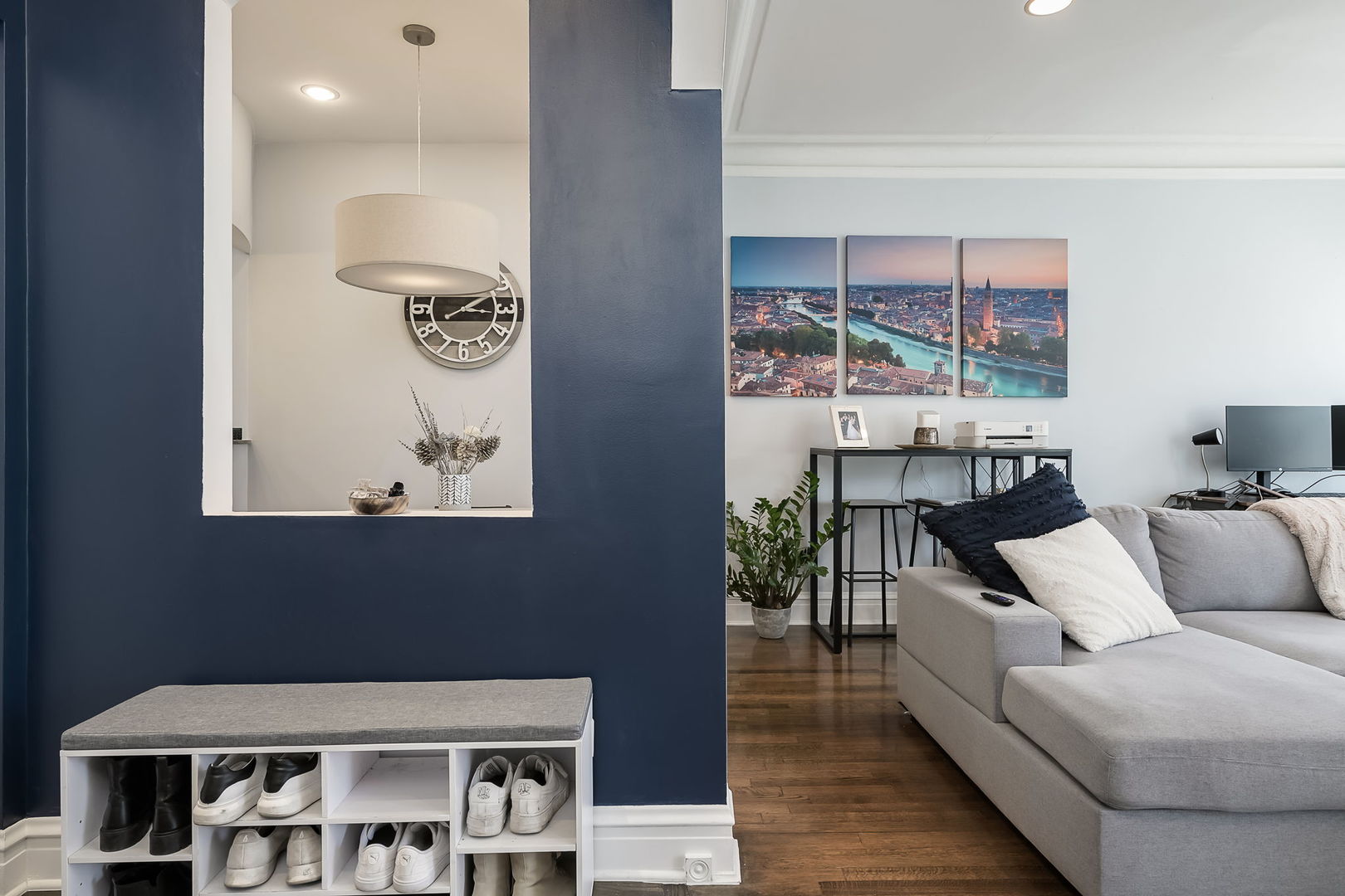 Undisclosed Address Chicago, IL 60657 - Photo 4 of 24 a living room with furniture a window and a fireplace