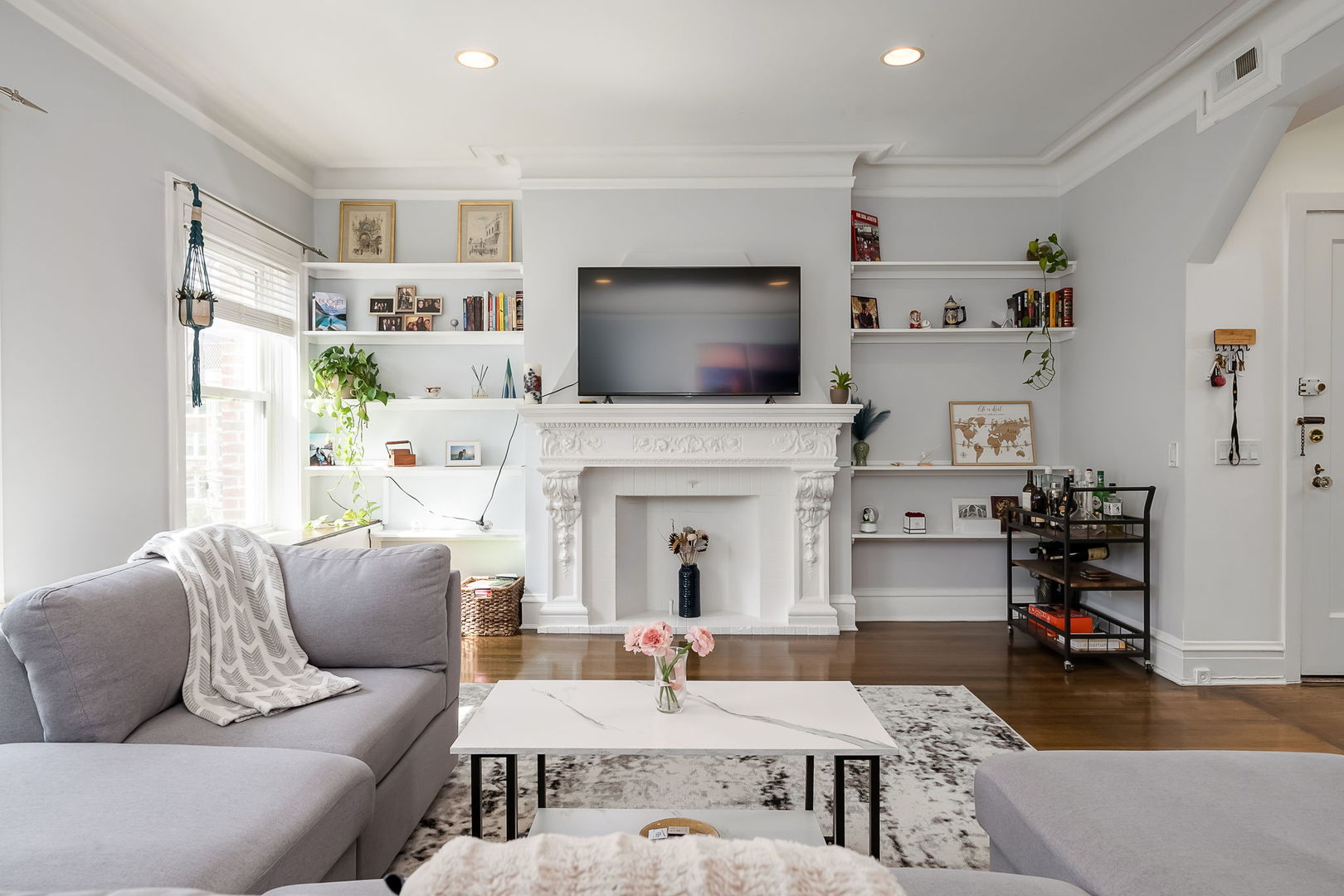 Undisclosed Address Chicago, IL 60657 - Photo 9 of 24 a living room with furniture and a fireplace