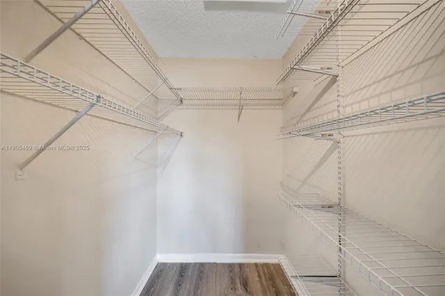 a view of a room with racks on the wall