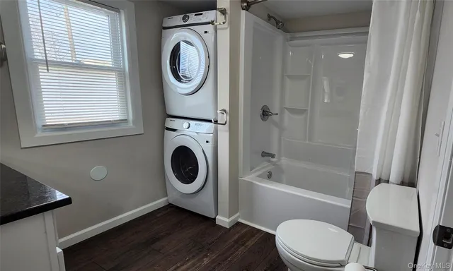 a bathroom with a toilet and a sink