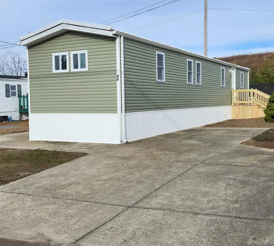 a view of backyard of house