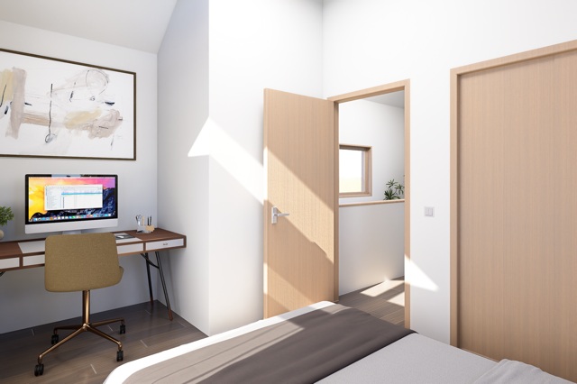 605 East 55th Street, Unit 6 Austin, TX 78751 - Photo 10 of 12 Bright bedroom featuring ample natural light, vaulted ceiling, and built-in workspace with modern finishes, perfect for comfort and productivity.
