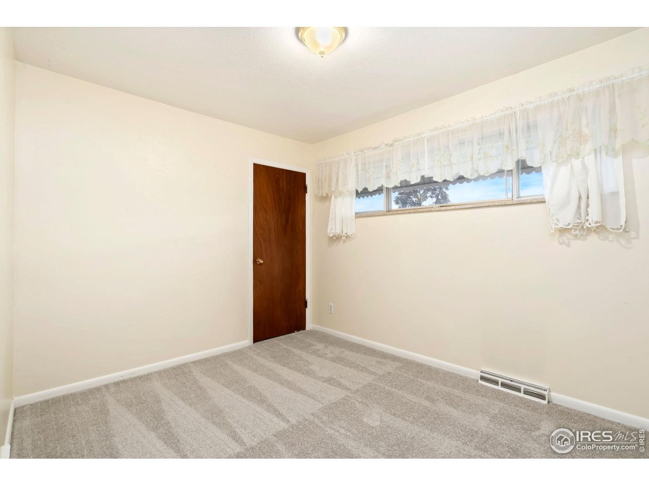 2046 26th Street Road Greeley, CO 80631 - Photo 21 of 34 a view of an empty room