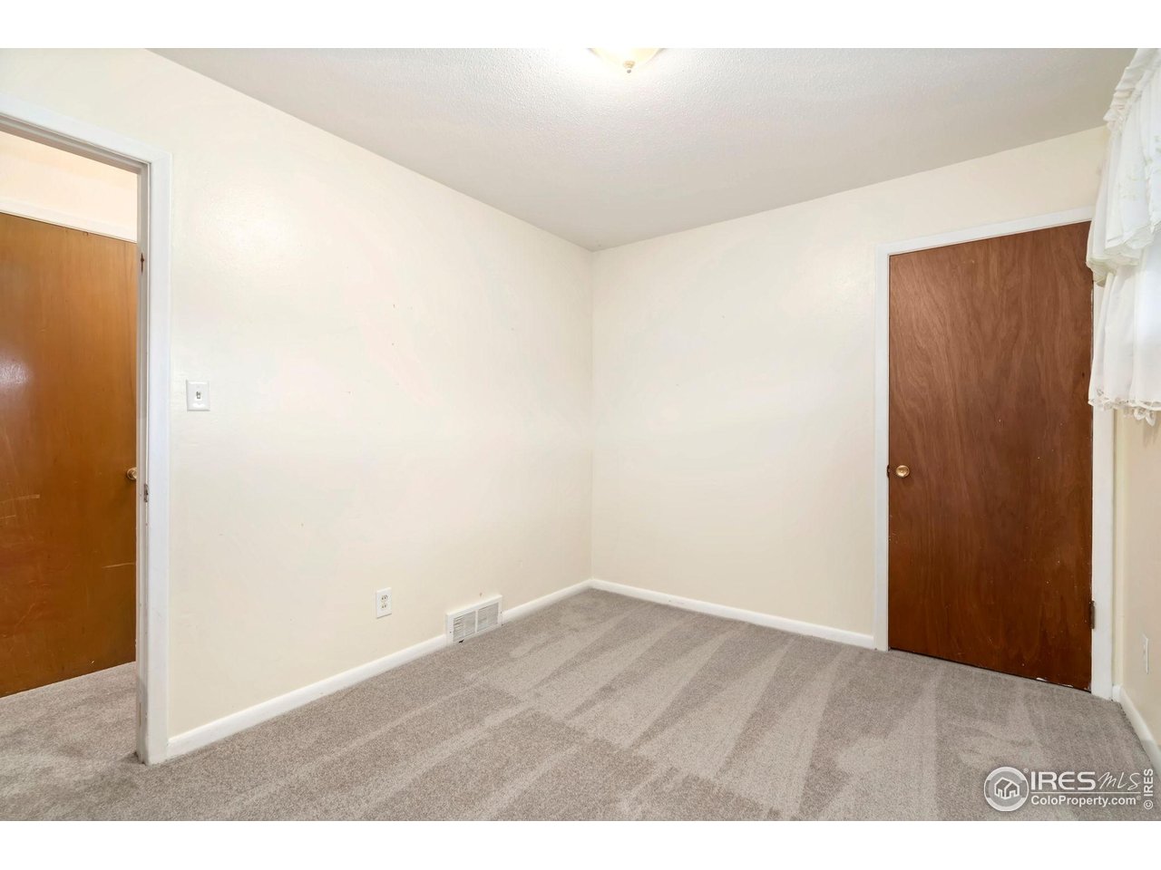 2046 26th Street Road Greeley, CO 80631 - Photo 22 of 34 a view of an empty room