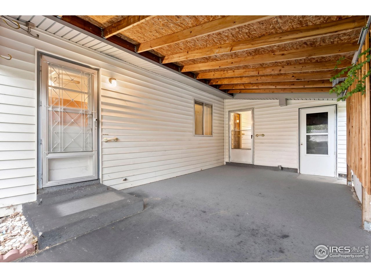 2046 26th Street Road Greeley, CO 80631 - Photo 26 of 34 a view of a house with a outdoor space