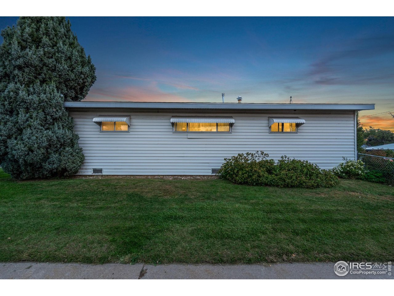 2046 26th Street Road Greeley, CO 80631 - Photo 4 of 34 a view of a backyard