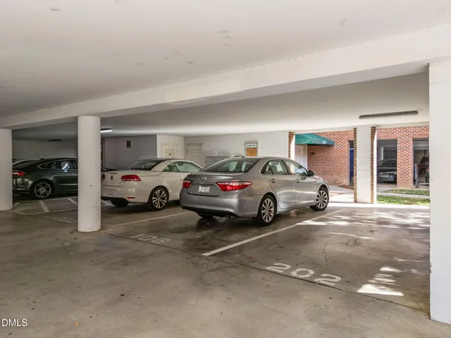a view of a cars park in front of house