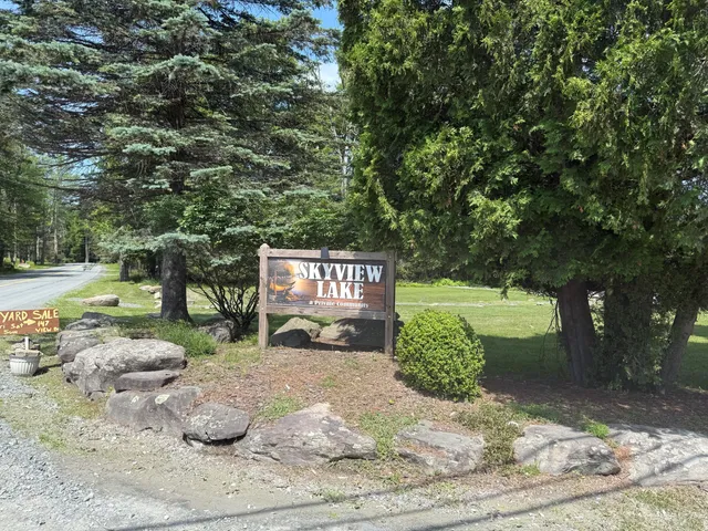 a view of a street with some trees