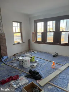 a room with furniture and window