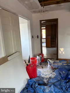 a room with furniture and wooden floor