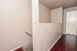 a view of hallway with stairs