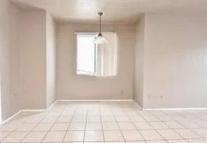 a view of an empty room with window