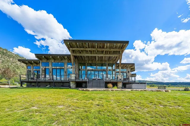 a view of a house with a swimming pool