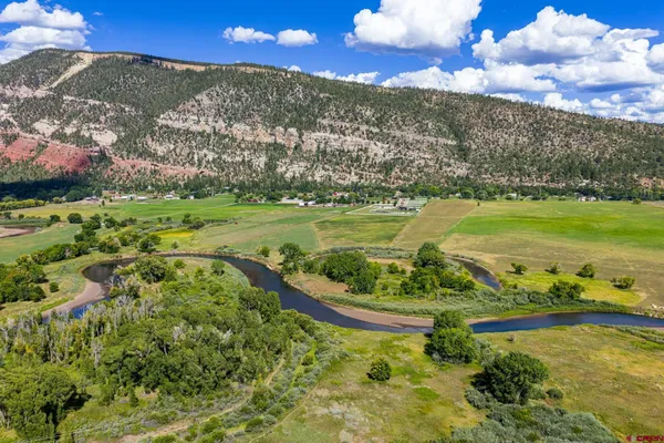 a view of a city with an ocean